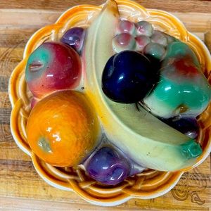 Vintage bowl, the fruit comes up so you can store stuff in bowl. Vintage plates.